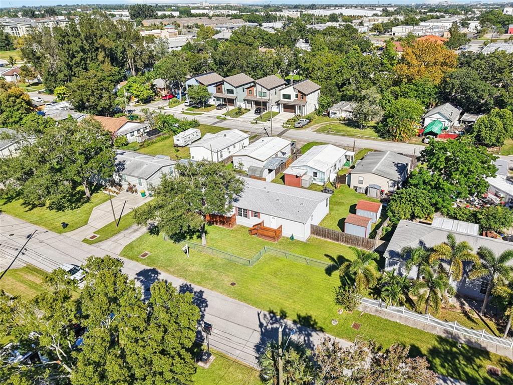 12373 Tree Street Largo, FL 33773 - Photo 40 of 43 an aerial view of residential houses with outdoor space