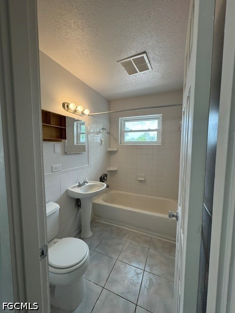 26 Alabama Road South Lehigh Acres, FL 33936 - Photo 10 of 10 a bathroom with a sink toilet and shower
