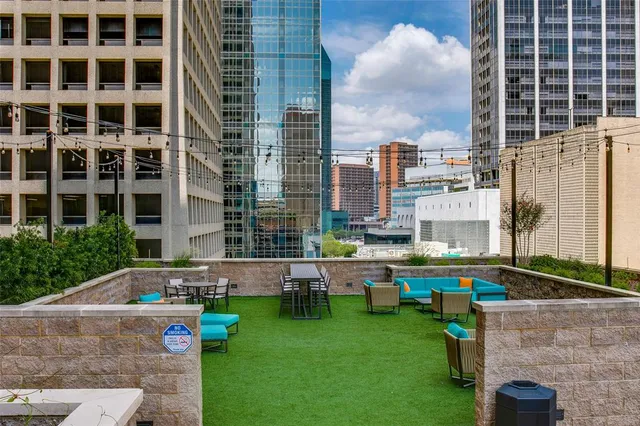 a view of barbeque grill with outdoor seating