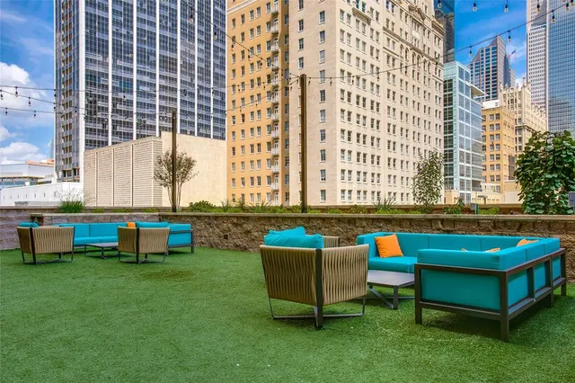 a front view of a building with outdoor space