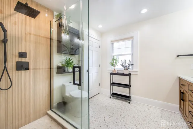 a view of a walk in closet and bedroom