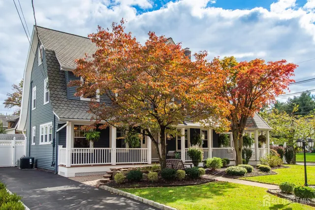 a front view of a building with garden