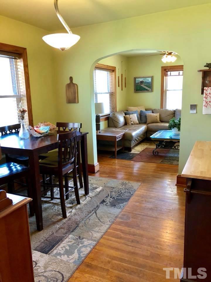 41 Anderson Jones Road Roxboro, NC 27574 - Photo 11 of 25 a living room with furniture and a wooden floor