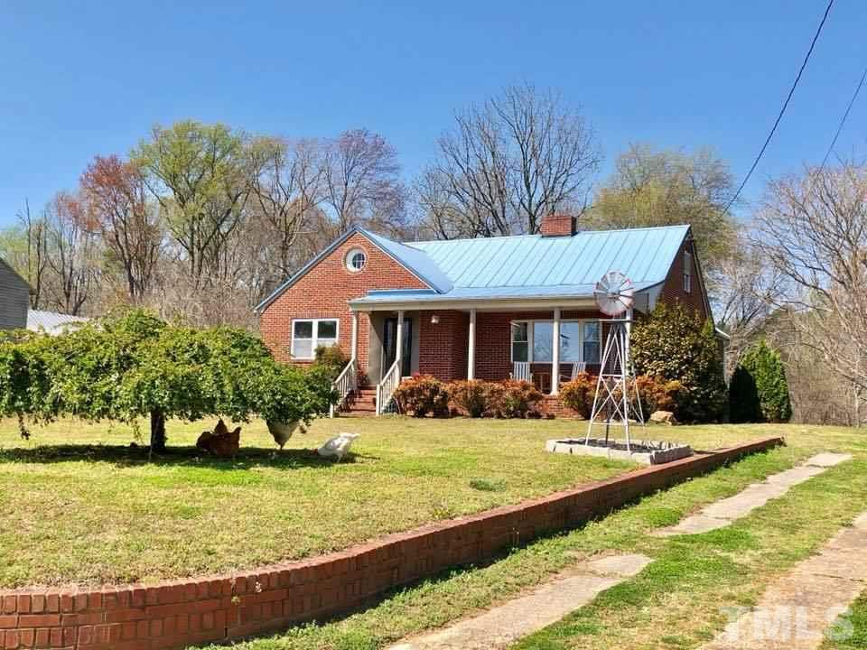 41 Anderson Jones Road Roxboro, NC 27574 - Photo 3 of 25 a front view of a house with a yard