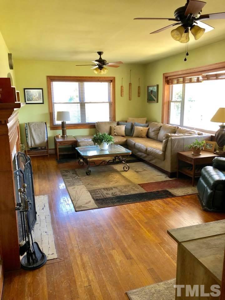 41 Anderson Jones Road Roxboro, NC 27574 - Photo 7 of 25 a living room with furniture and a large window