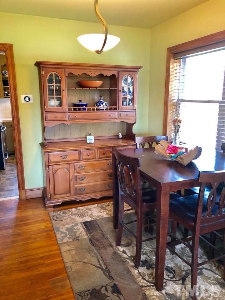 41 Anderson Jones Road Roxboro, NC 27574 - Photo 10 of 25 a view of a dining room with furniture window and wooden floor