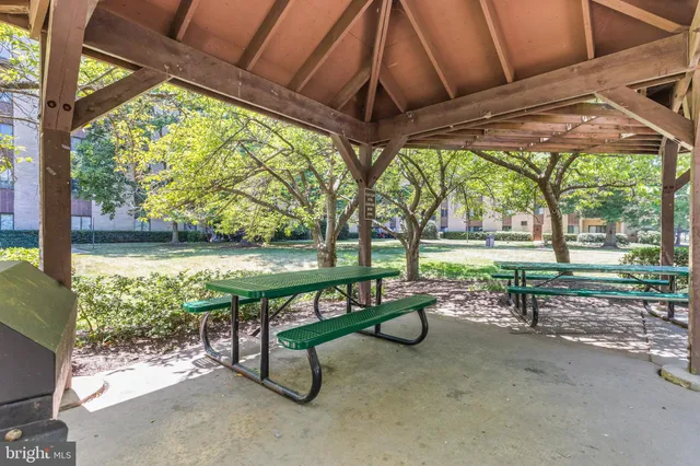 a view of a entryway door with plants