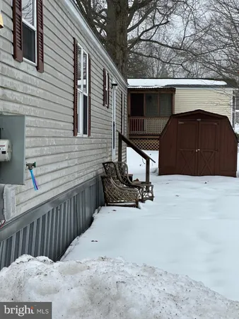 a view of backyard with deck