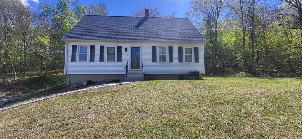 56 Cote Road Monson, MA 01057 - Photo 2 of 20 a front view of a house with a garden