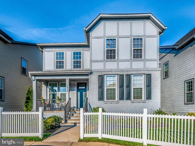 a front view of a house with a porch