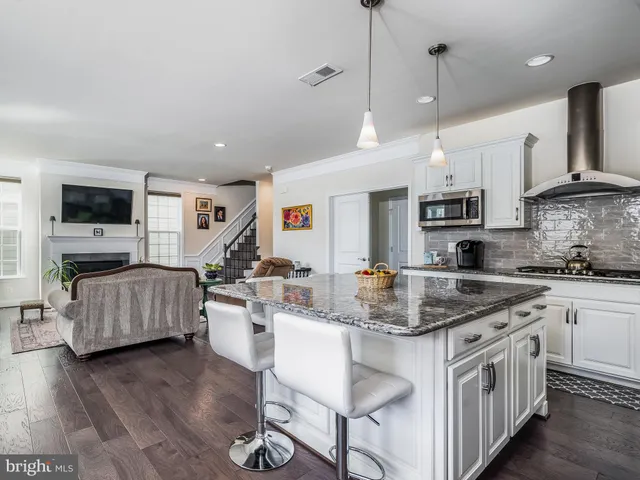a bathroom with a double vanity sink mirror and