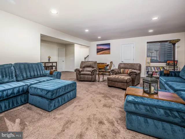 a view of a cafe with sitting area