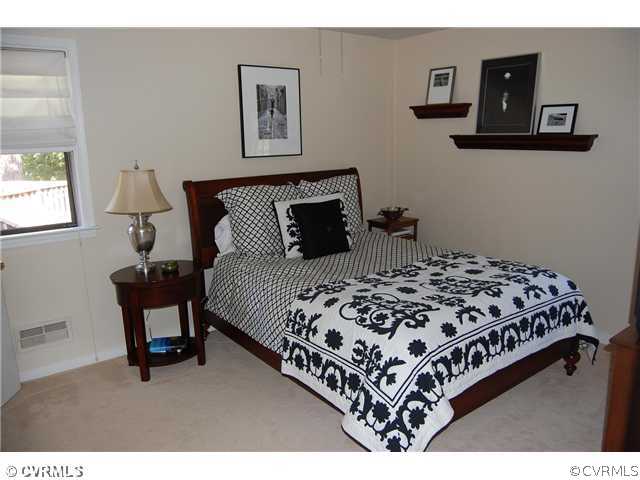 7556 Prairie Road Richmond, VA 23225 - Photo 4 of 12 Master Bedroom - Master bedroom with a private ha