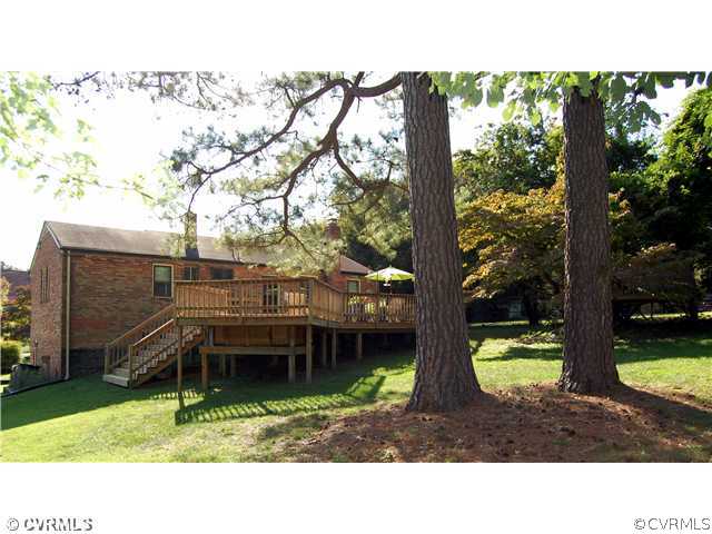 7556 Prairie Road Richmond, VA 23225 - Photo 10 of 12 Exterior Back - Huge lot, huge deck, and plenty of