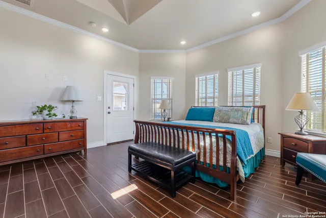 a bed room with a bed and window