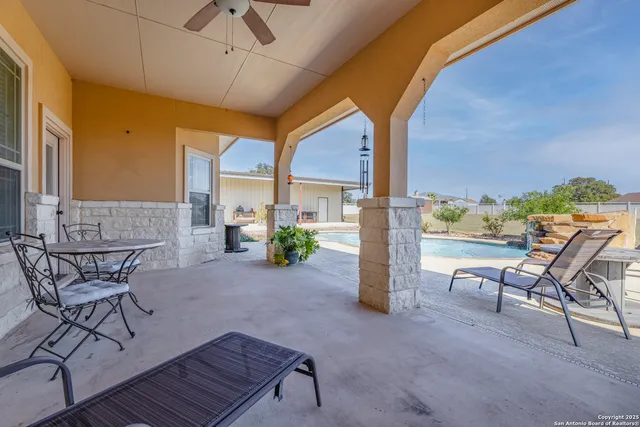 a building outdoor space with patio furniture