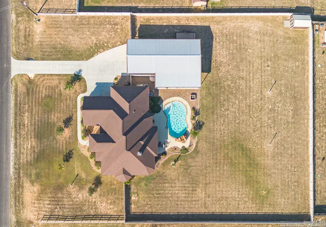 a view of a swimming pool with a lake