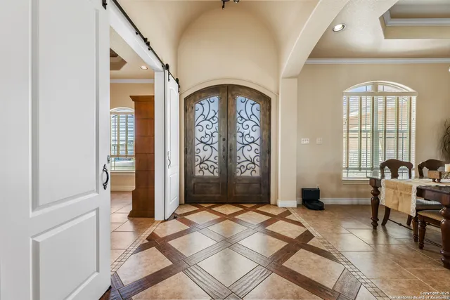 a view of livingroom with furniture and windows