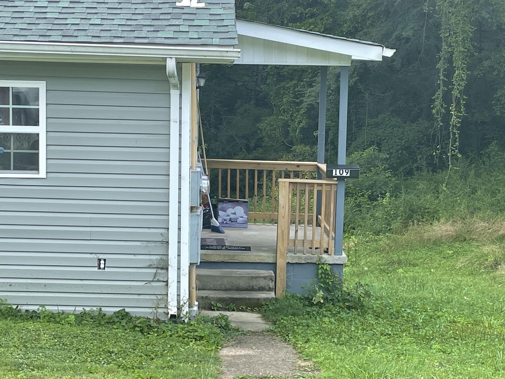 107109 Hunter Place Oak Ridge, TN 37830 - Photo 2 of 9 a view of a chair in backyard of the house