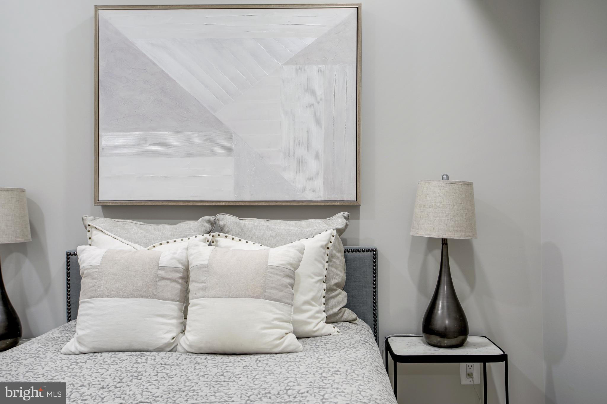 2301 Ontario Road Northwest, Unit 101 Washington, DC 20009 - Photo 16 of 24 a close view of a couch in wooden floor