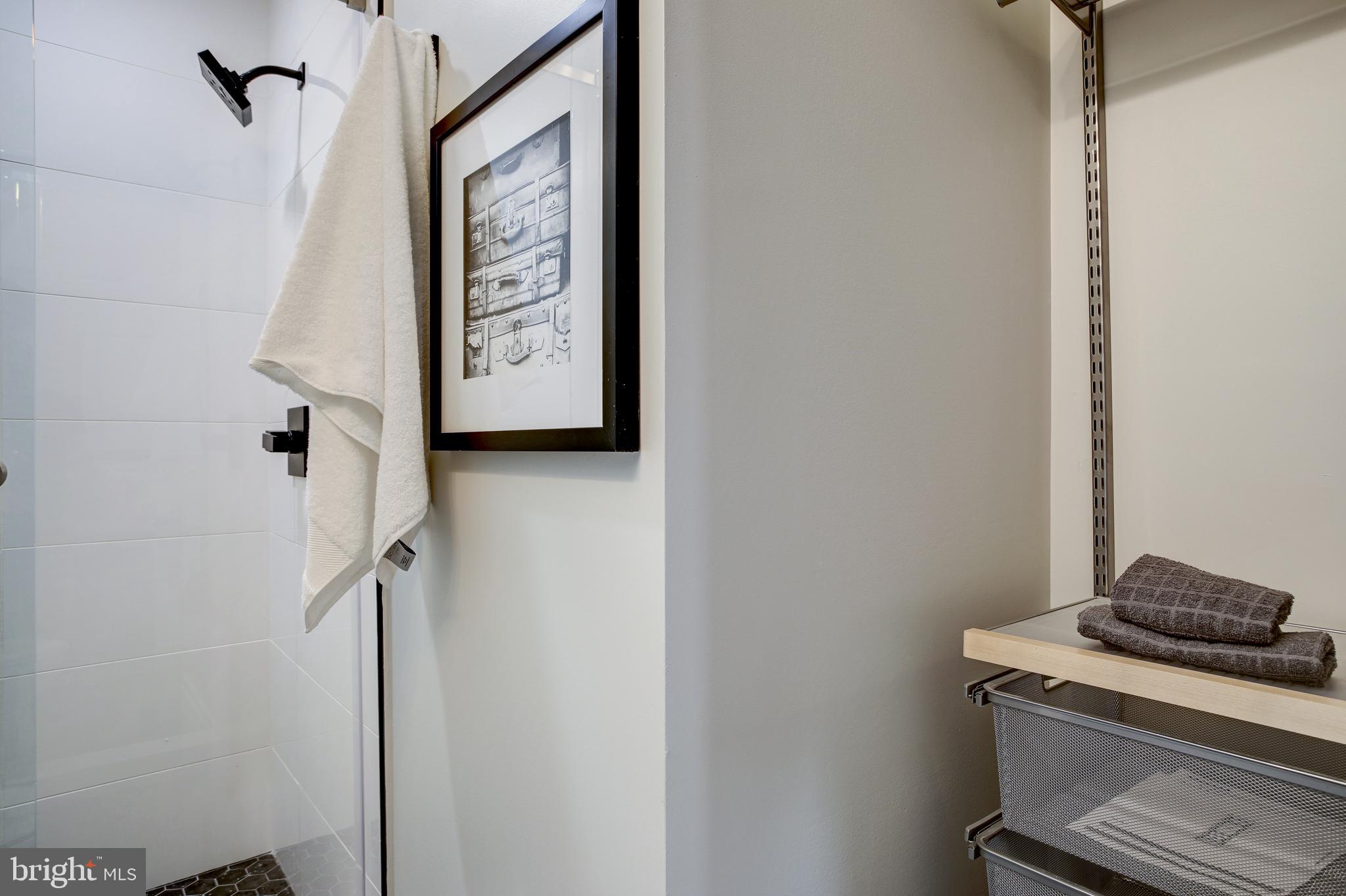 2301 Ontario Road Northwest, Unit 101 Washington, DC 20009 - Photo 23 of 24 a hallway with a stove top oven