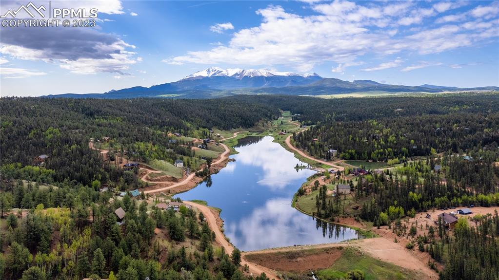 1699 Spring Valley Drive Divide, CO 80814 - Photo 37 of 43 a view of a lake with a mountain in the background
