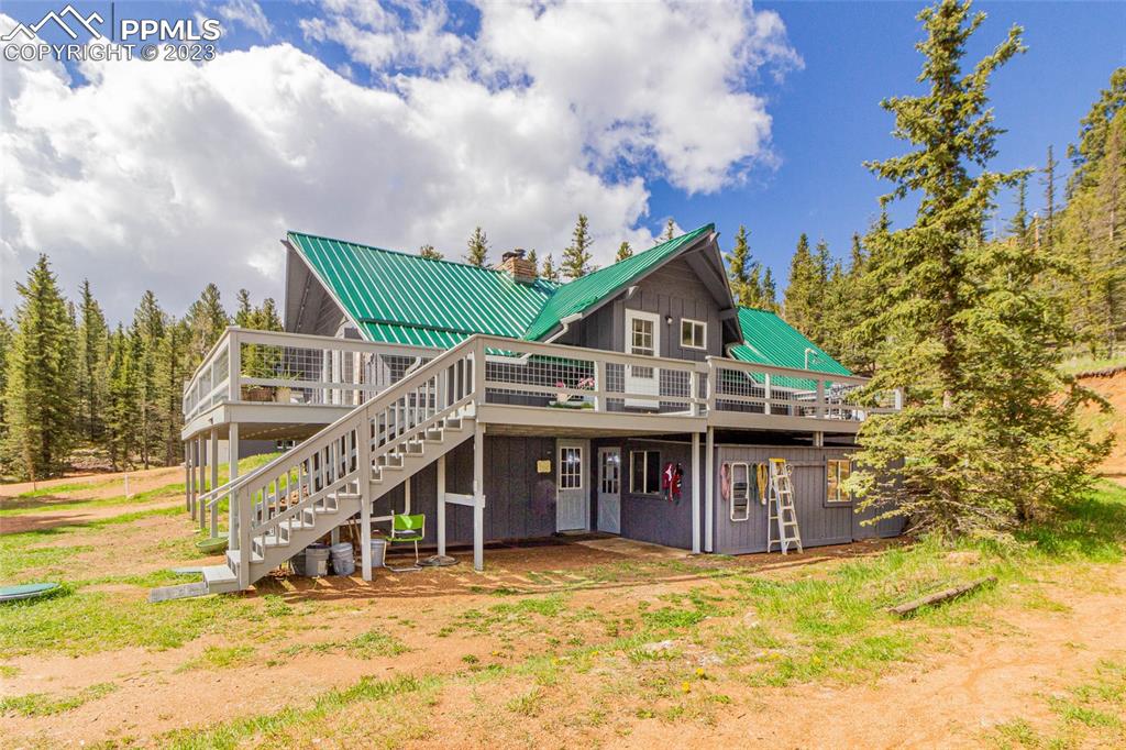 1699 Spring Valley Drive Divide, CO 80814 - Photo 4 of 43 a view of a house with a yard