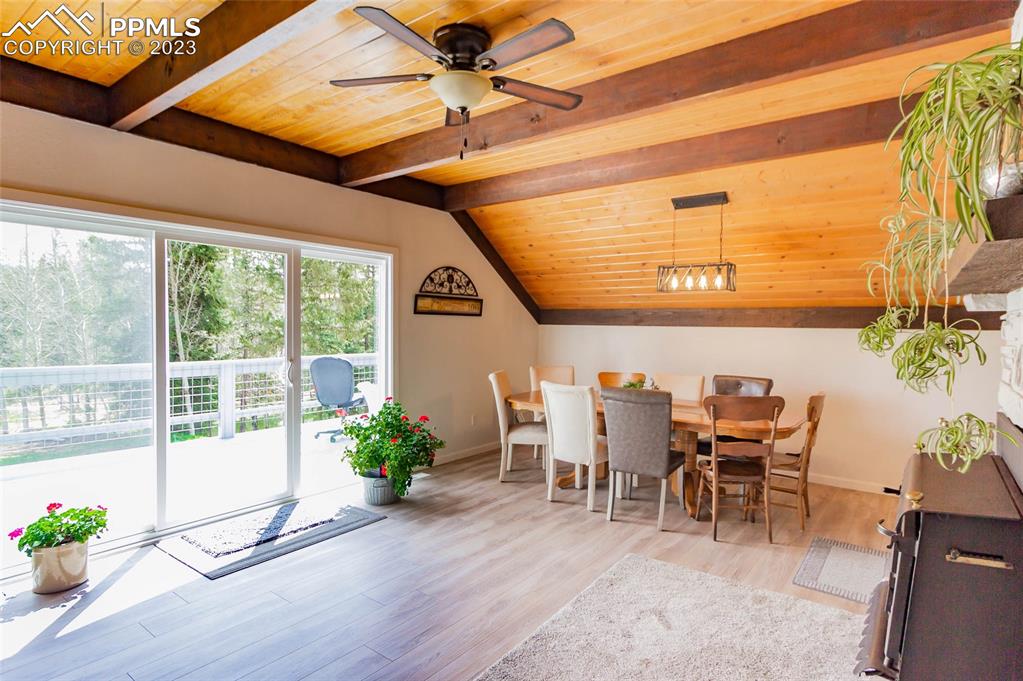 1699 Spring Valley Drive Divide, CO 80814 - Photo 7 of 43 a dining room with furniture entryway and wooden floor