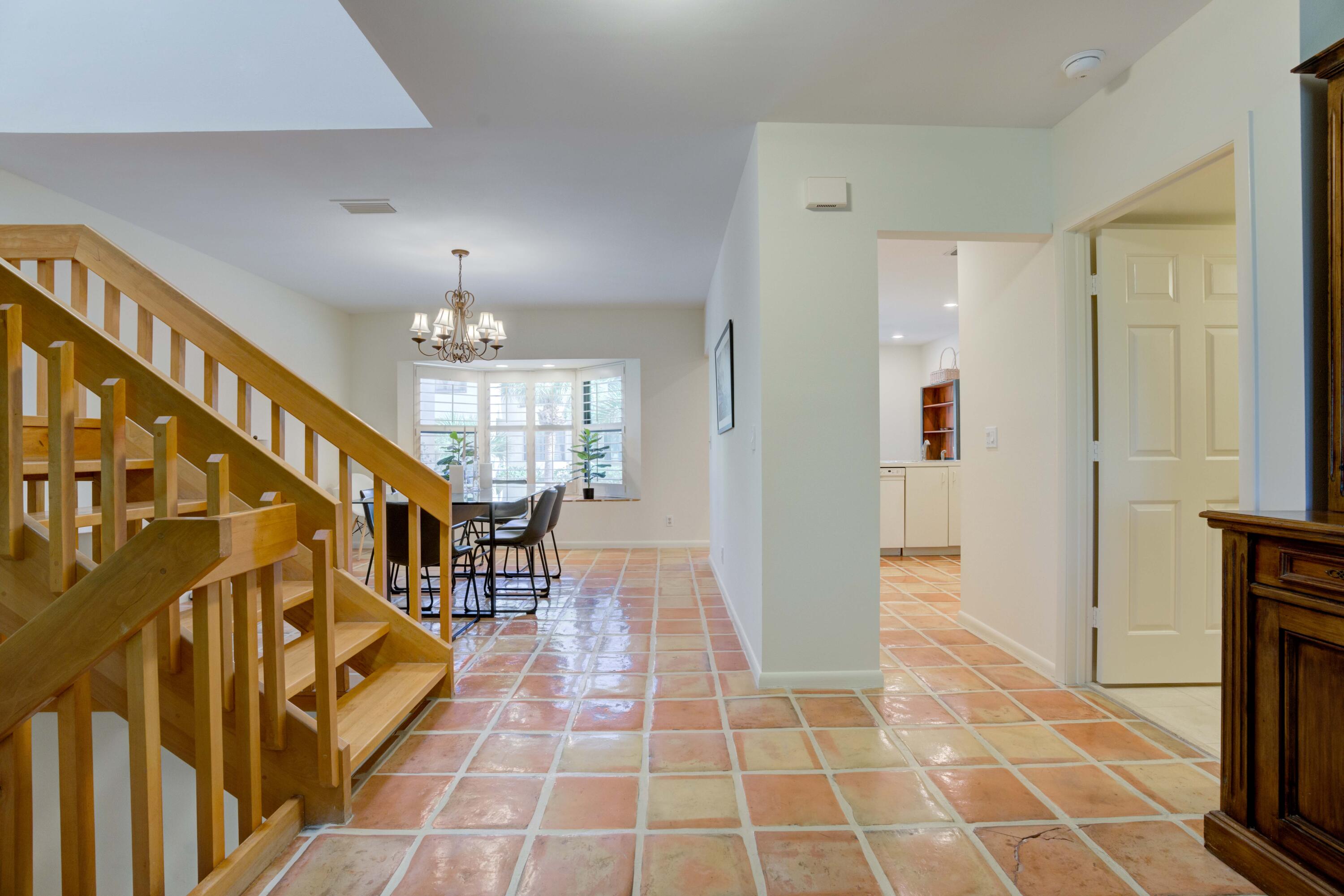 170 Celestial Way, Unit 32 Juno Beach, FL 33408 - Photo 12 of 30 a view of an entryway with wooden floor