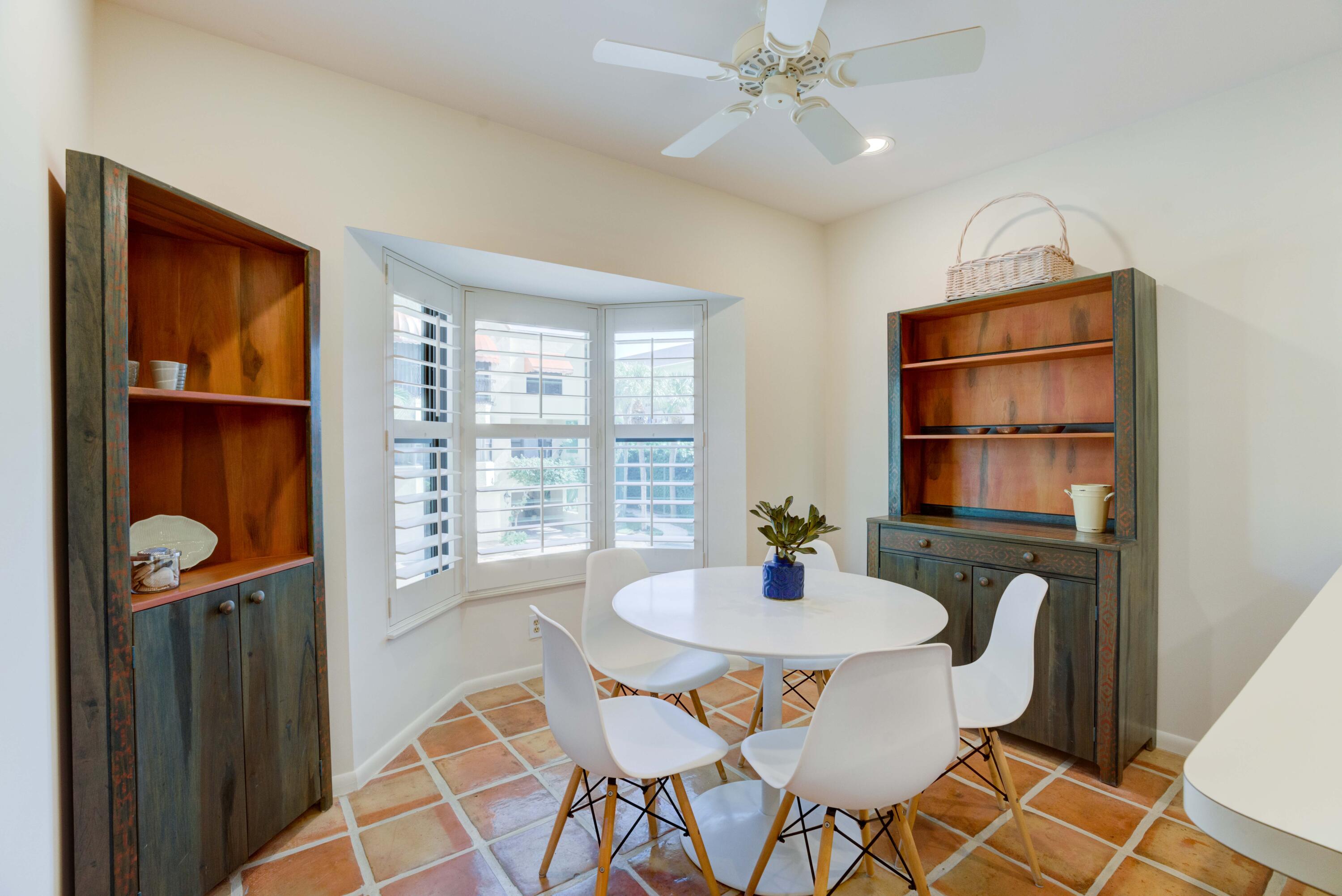 170 Celestial Way, Unit 32 Juno Beach, FL 33408 - Photo 15 of 30 a workspace with furniture and window