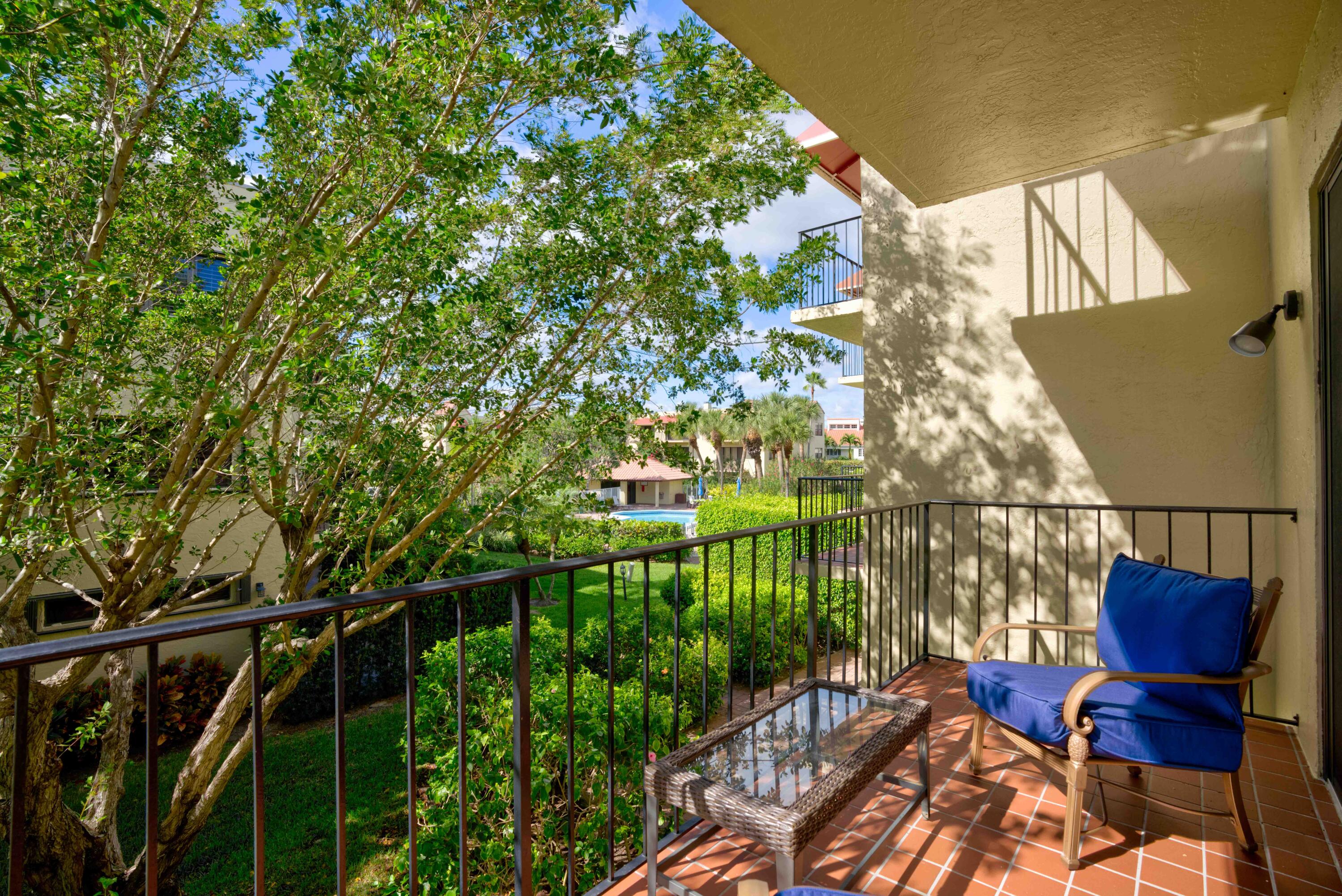 170 Celestial Way, Unit 32 Juno Beach, FL 33408 - Photo 22 of 30 a view of a balcony with chairs