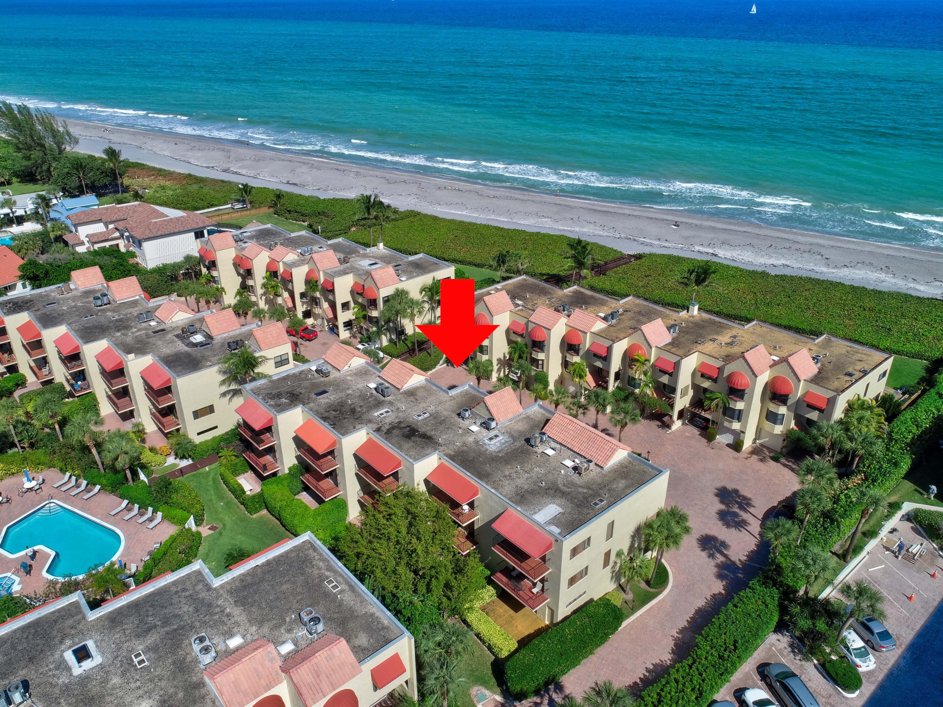 170 Celestial Way, Unit 32 Juno Beach, FL 33408 - Photo 3 of 30 a view of a outdoor space