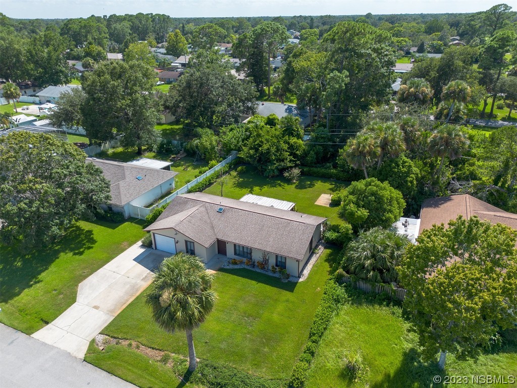 2908 Orange Tree Drive Edgewater, FL 32141 - Photo 28 of 30 an aerial view of a house with a garden