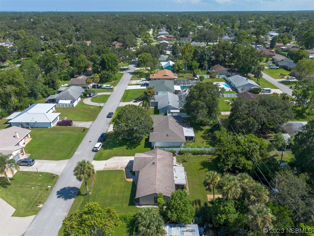 2908 Orange Tree Drive Edgewater, FL 32141 - Photo 29 of 30 an aerial view of multiple house
