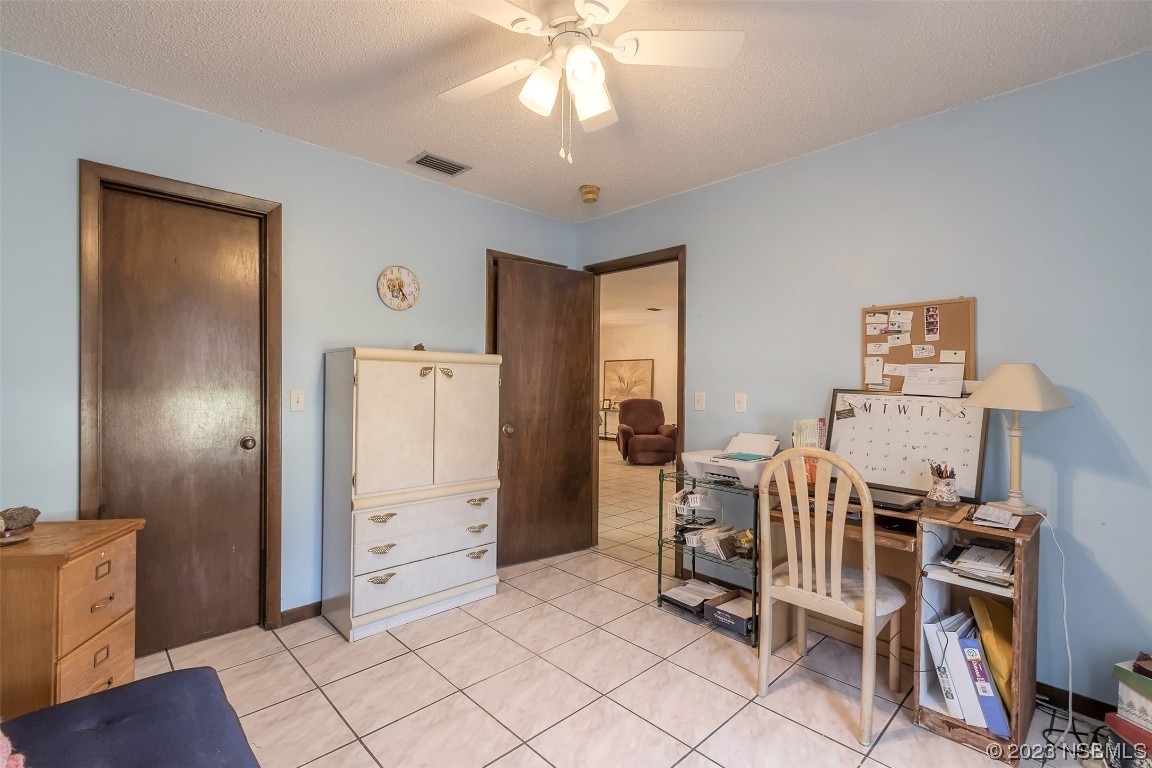 2908 Orange Tree Drive Edgewater, FL 32141 - Photo 8 of 30 a dining room with furniture and window