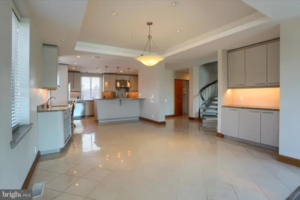 a view of a kitchen with a sink cabinets and window