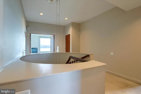 a view of kitchen island with a sink