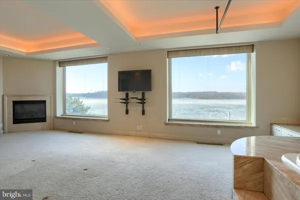 a view of livingroom with furniture and a window