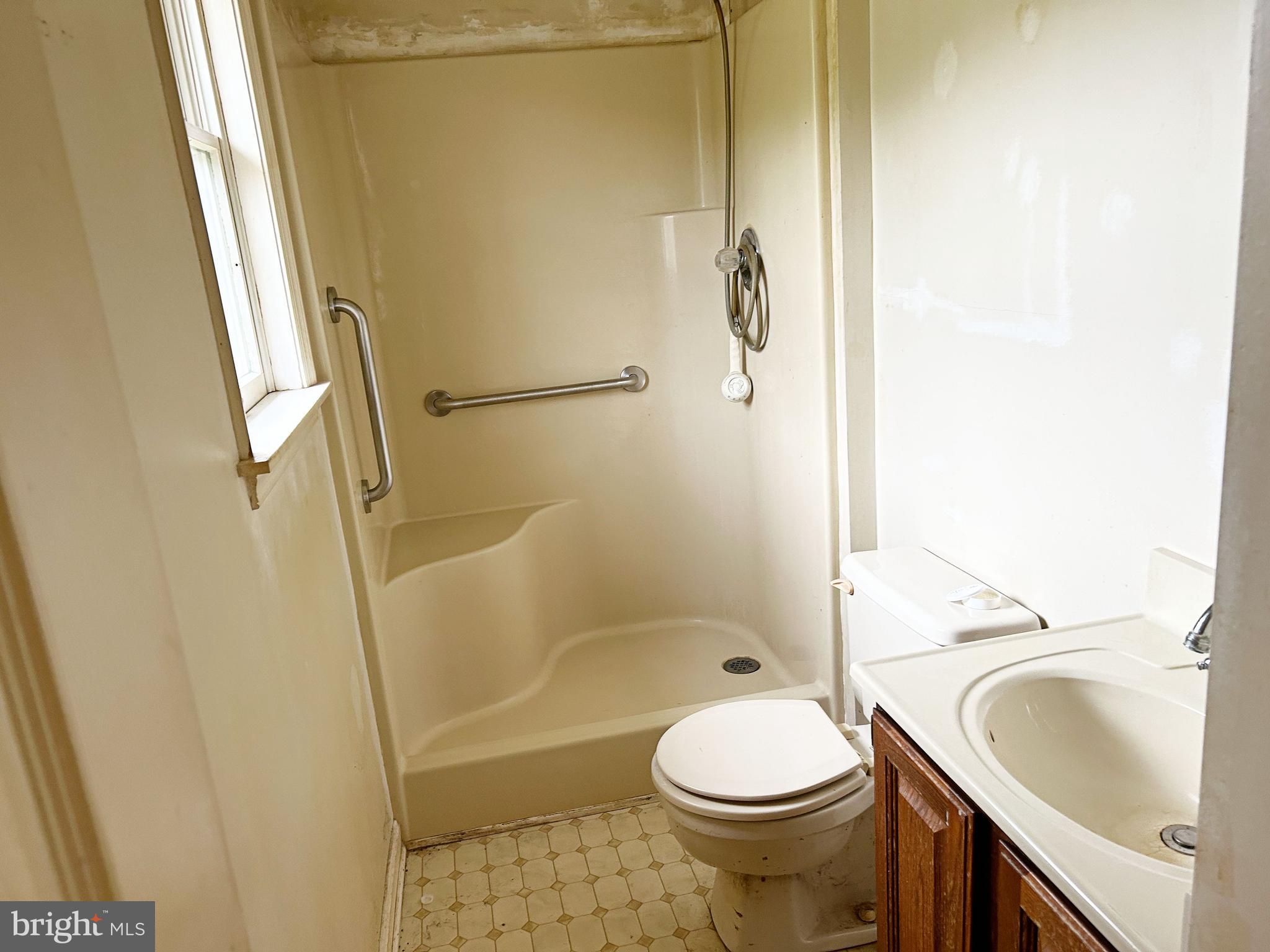 3832 Prospect Road Street, MD 21154 - Photo 12 of 21 a bathroom with a sink toilet and shower