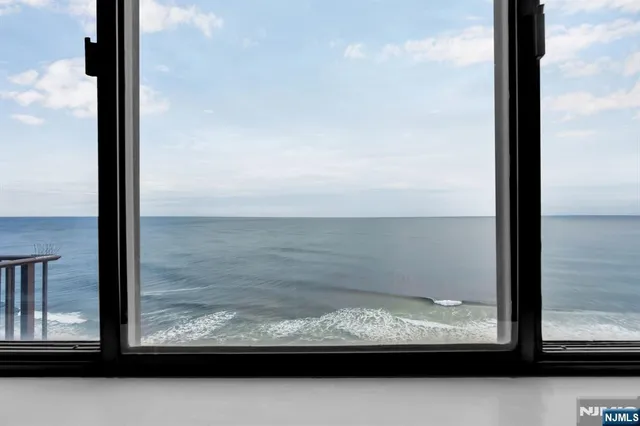 a view of a room next to a window