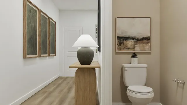 a bathroom with a toilet and a sink