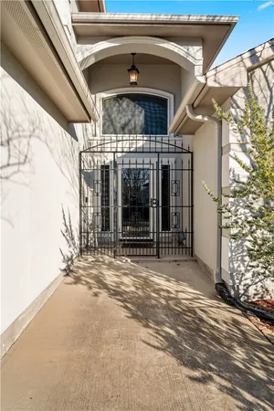 a view of a building with door and glass door