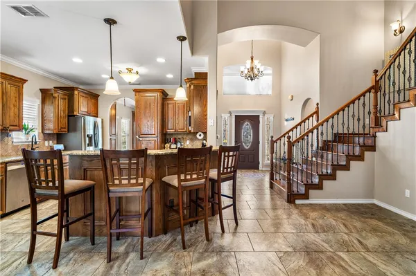 a view of a dining room with furniture