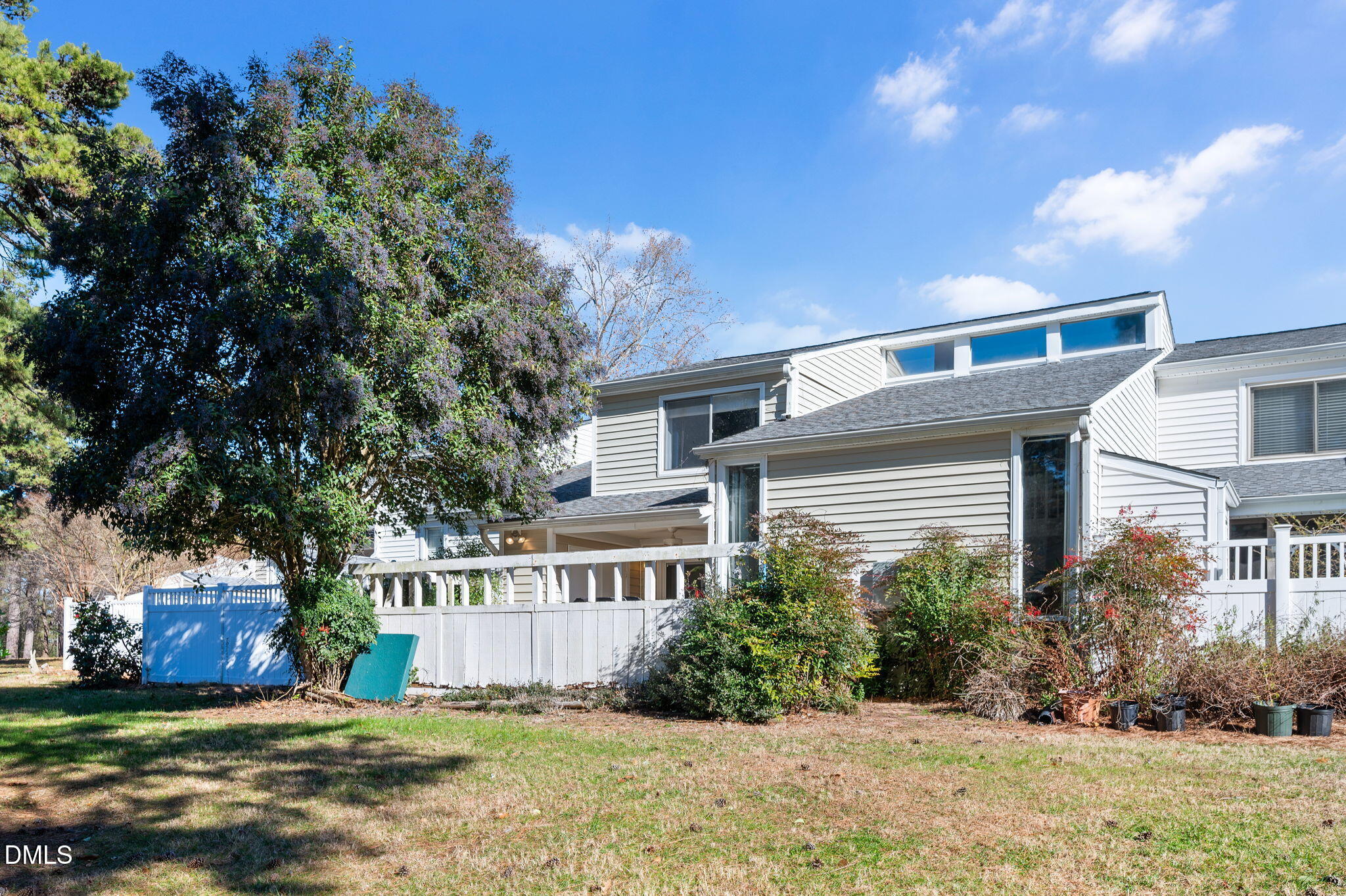4603 Edwards Mill Road Raleigh, NC 27612 - Photo 22 of 26 a view of a house with a yard