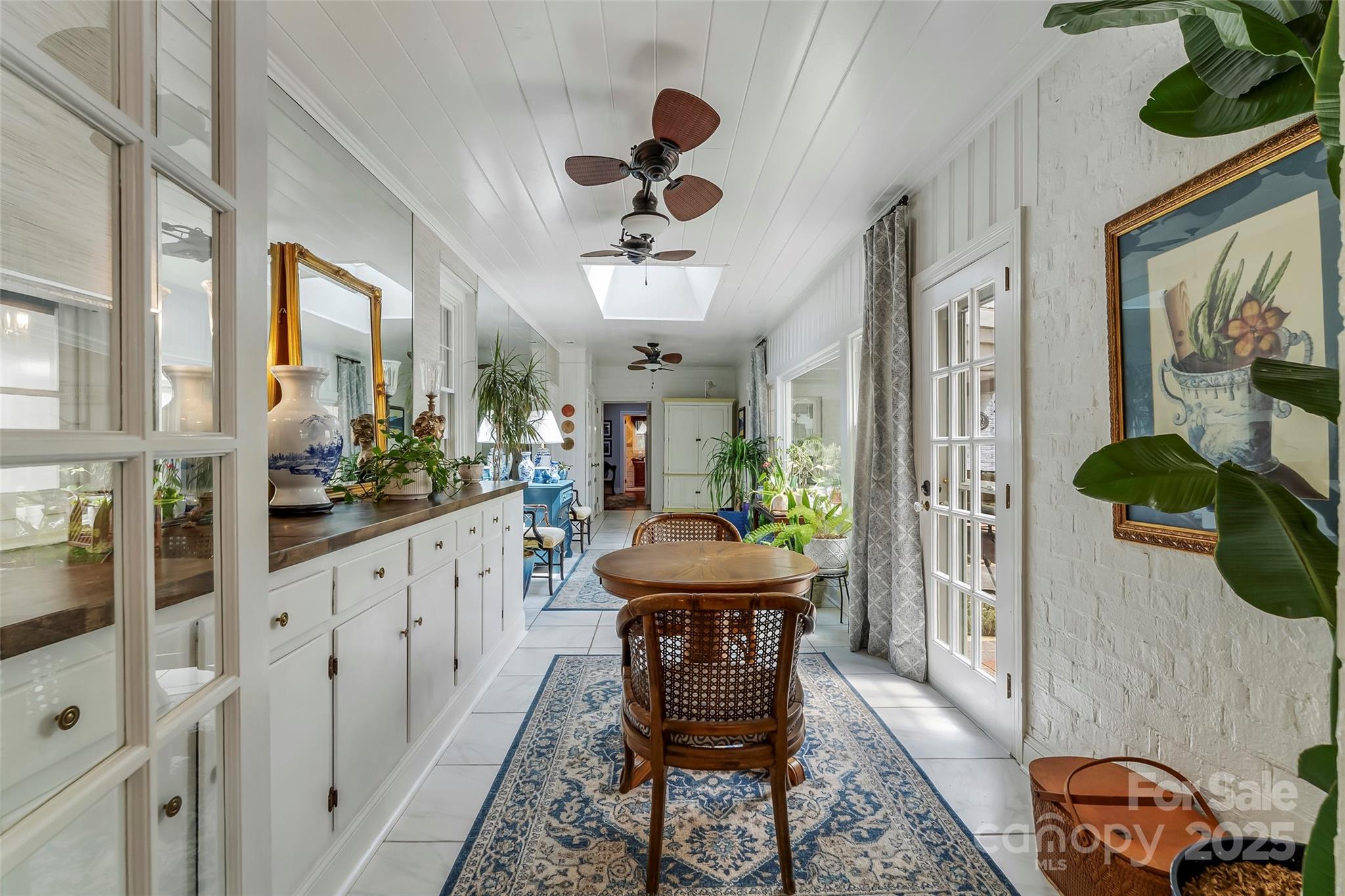 958 Highway 18 Morganton, NC 28655 - Photo 16 of 44 a view of a livingroom with furniture and a floor to ceiling window