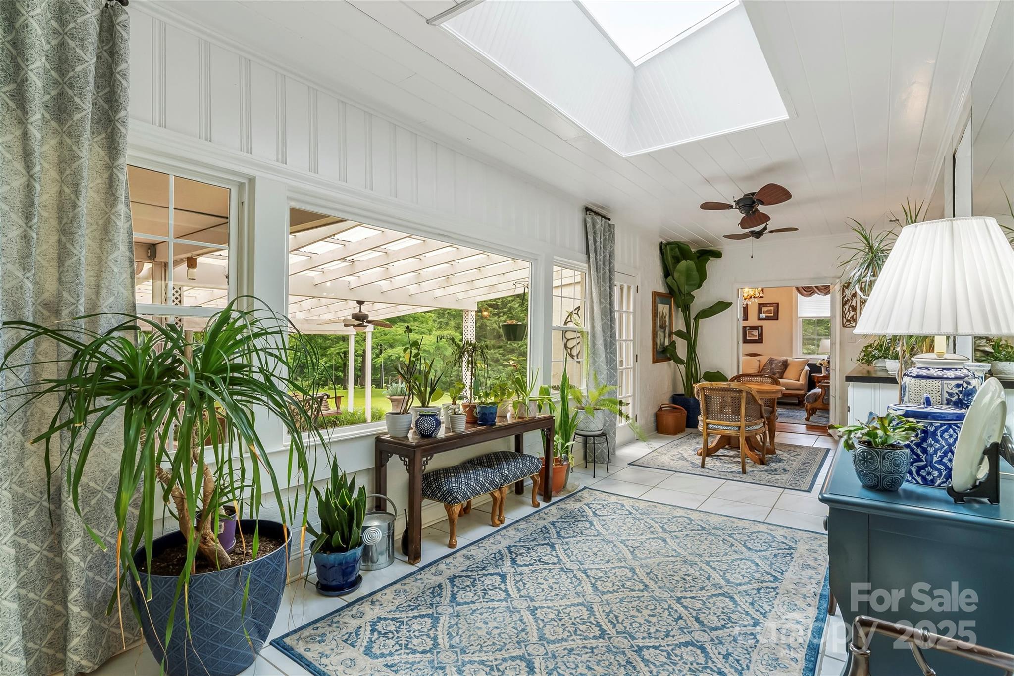 958 Highway 18 Morganton, NC 28655 - Photo 17 of 44 a living room with furniture and a potted plant