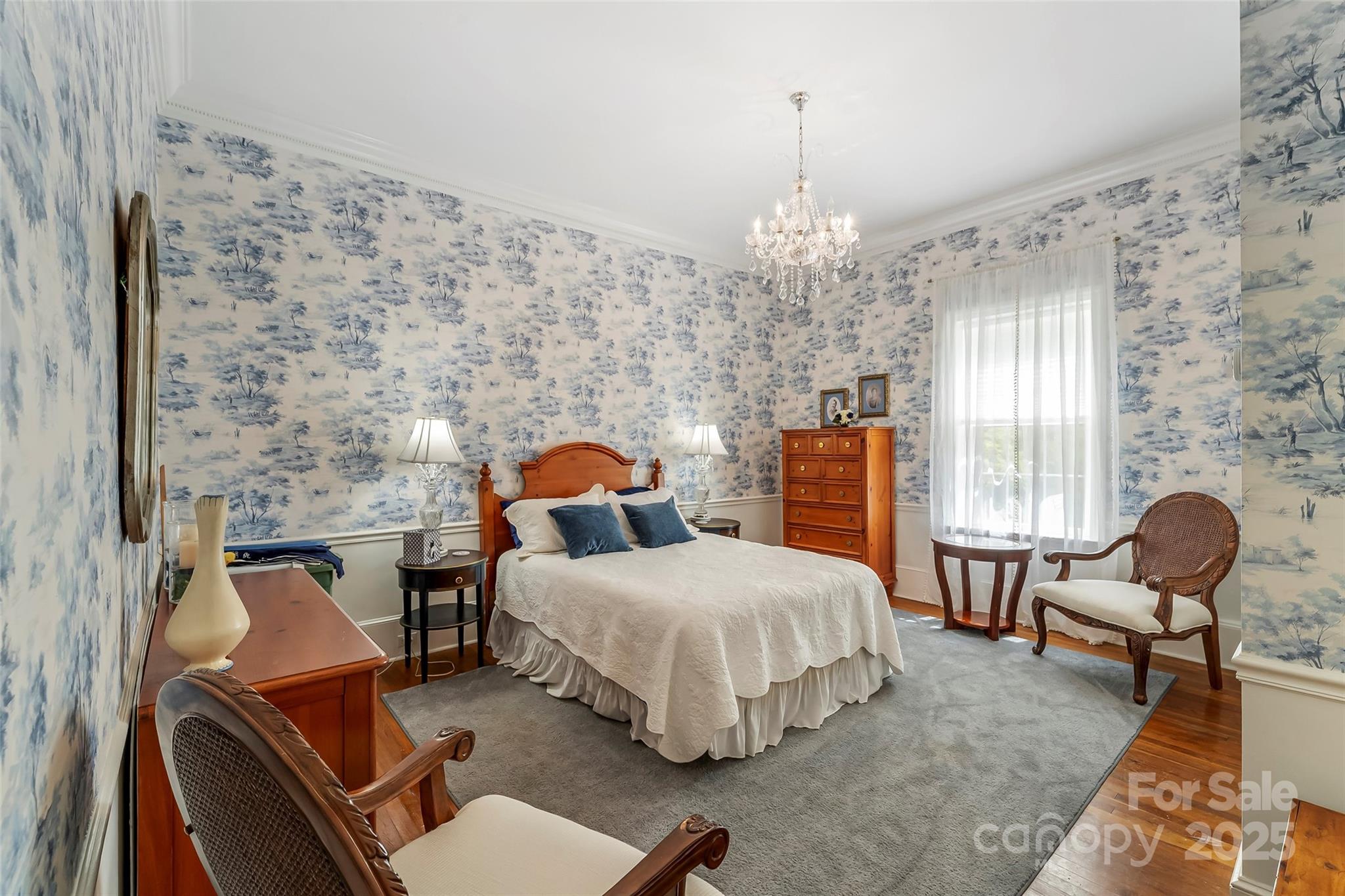 958 Highway 18 Morganton, NC 28655 - Photo 18 of 44 a bedroom with furniture and a chandelier