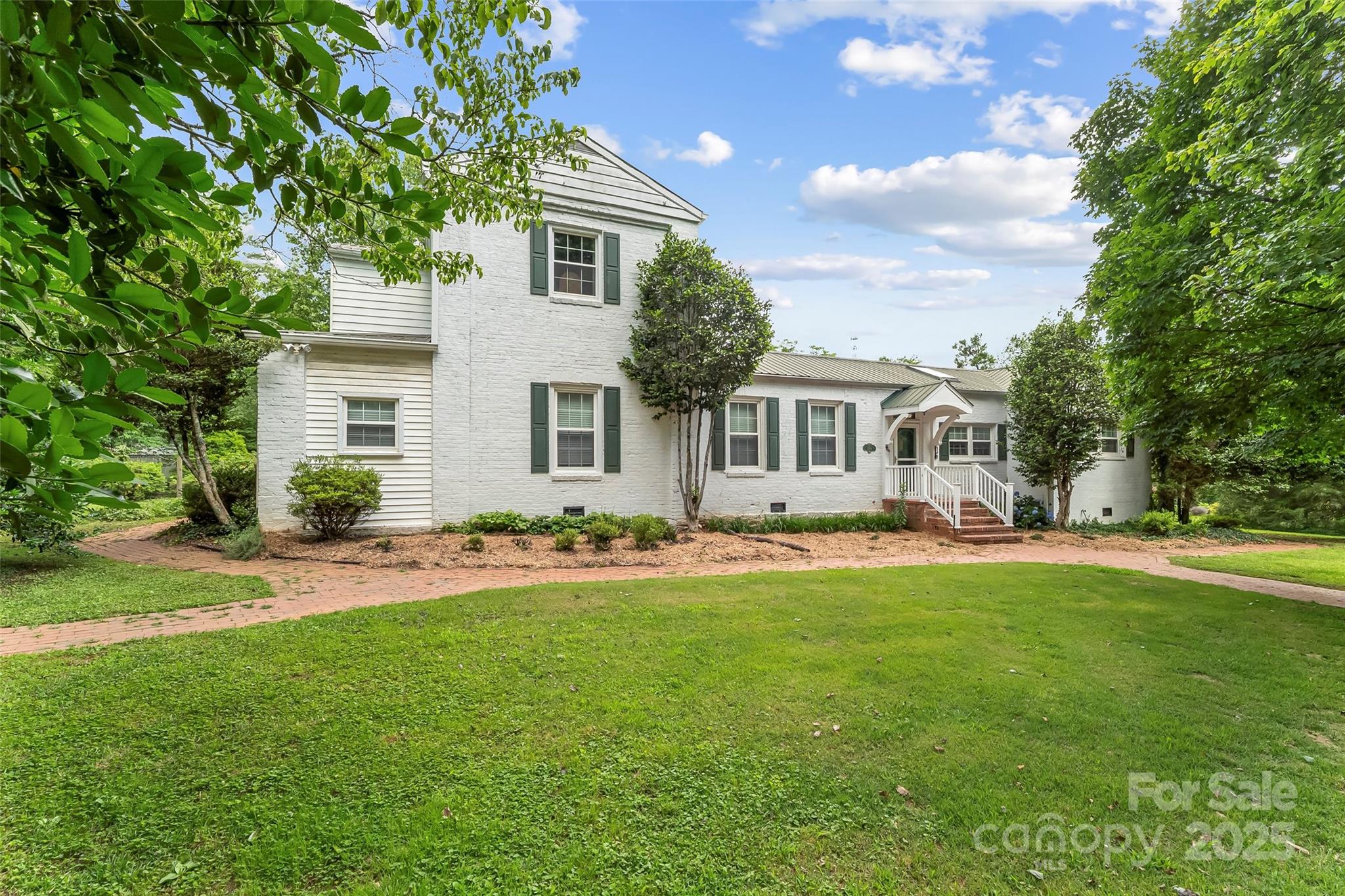 958 Highway 18 Morganton, NC 28655 - Photo 2 of 44 a front view of house with yard and green space