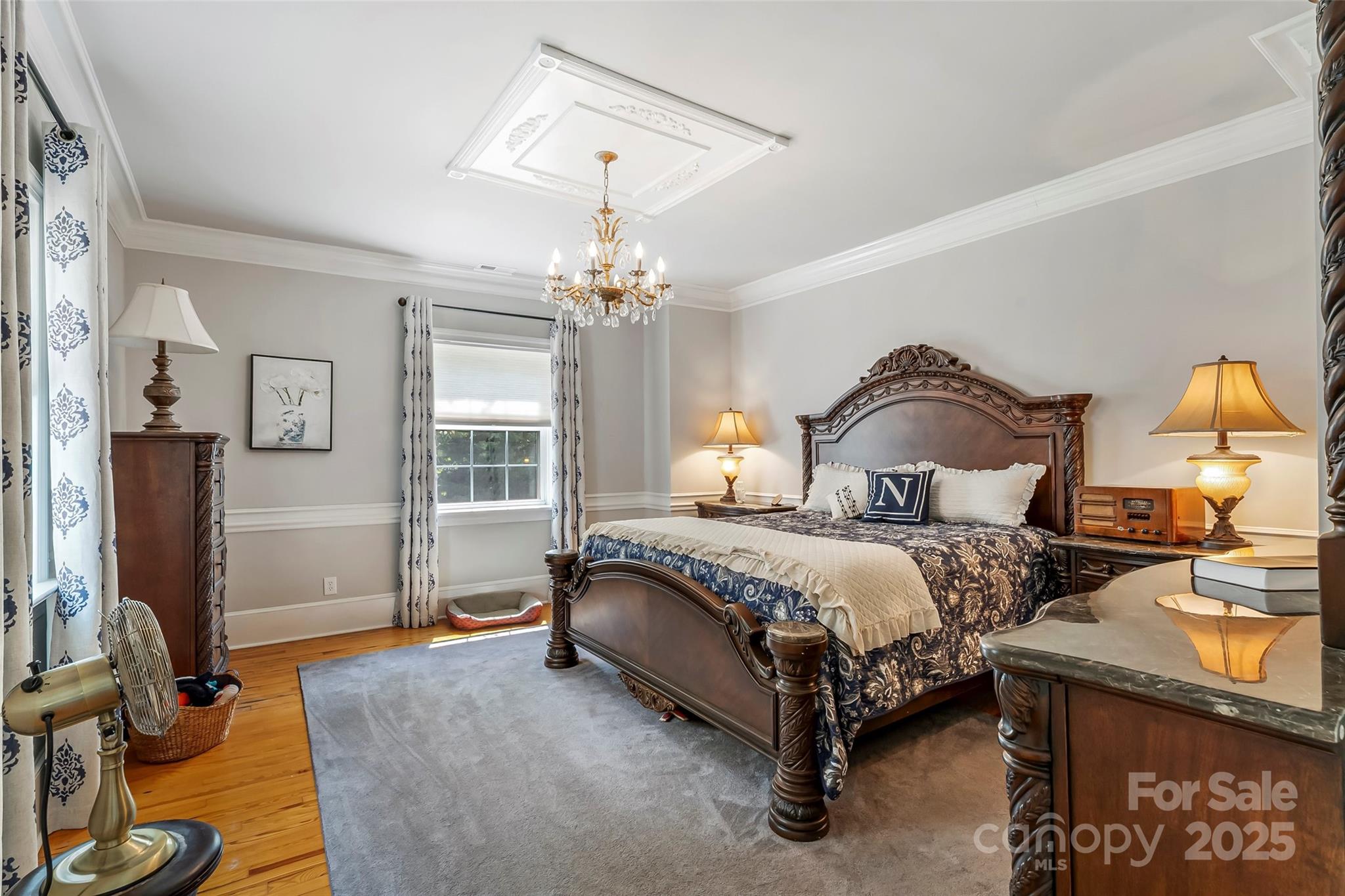 958 Highway 18 Morganton, NC 28655 - Photo 26 of 44 a spacious bedroom with a bed and wooden floor