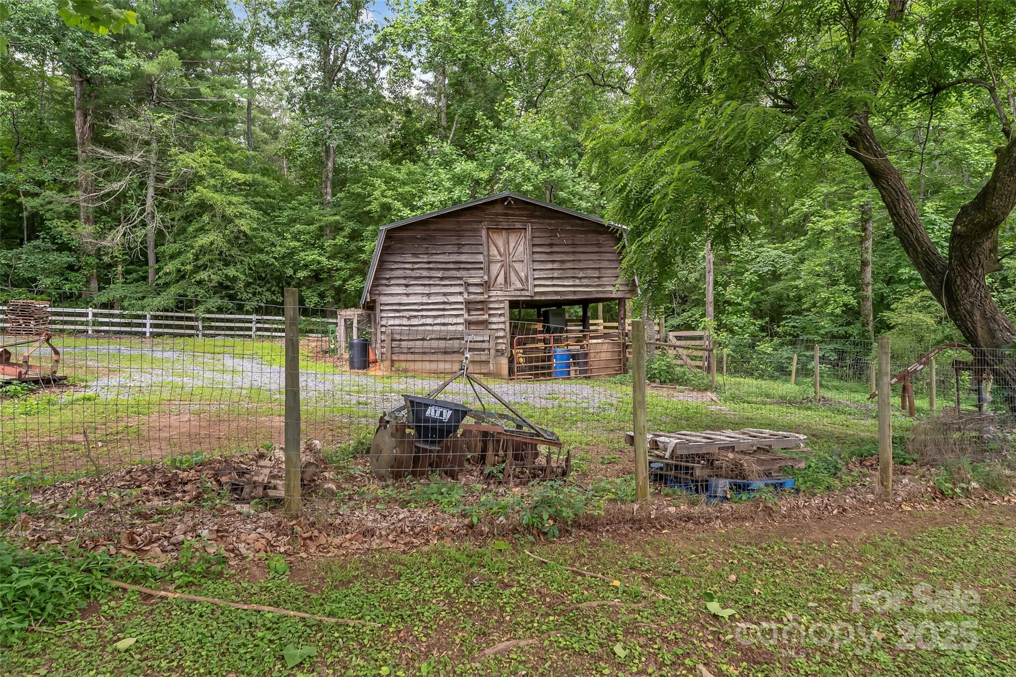 958 Highway 18 Morganton, NC 28655 - Photo 35 of 44 a backyard of a house with lots of green space